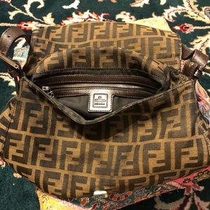 purse black and brown fendi good condition .